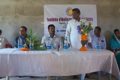 Discussion with local village leaders about Health ATM in rural Orissa, India 2010