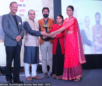 20181224-Ashish Joshi founder of FHTS receiving 2018 Social Activism award by the Promising Indian Society